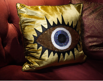Decorative pillow with eye motif